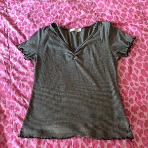 green and white striped shirt